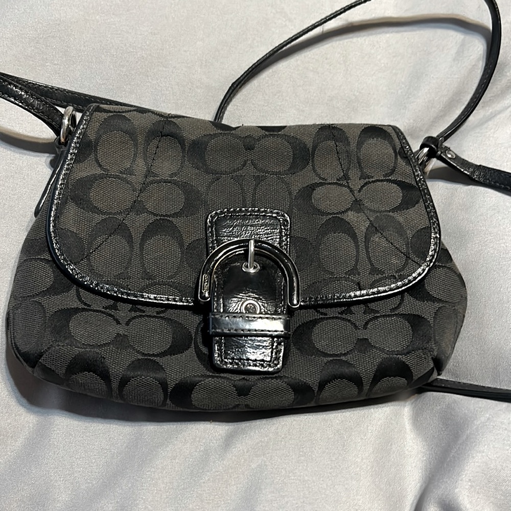 Coach hand bag. Crossbody style or over the shoulder